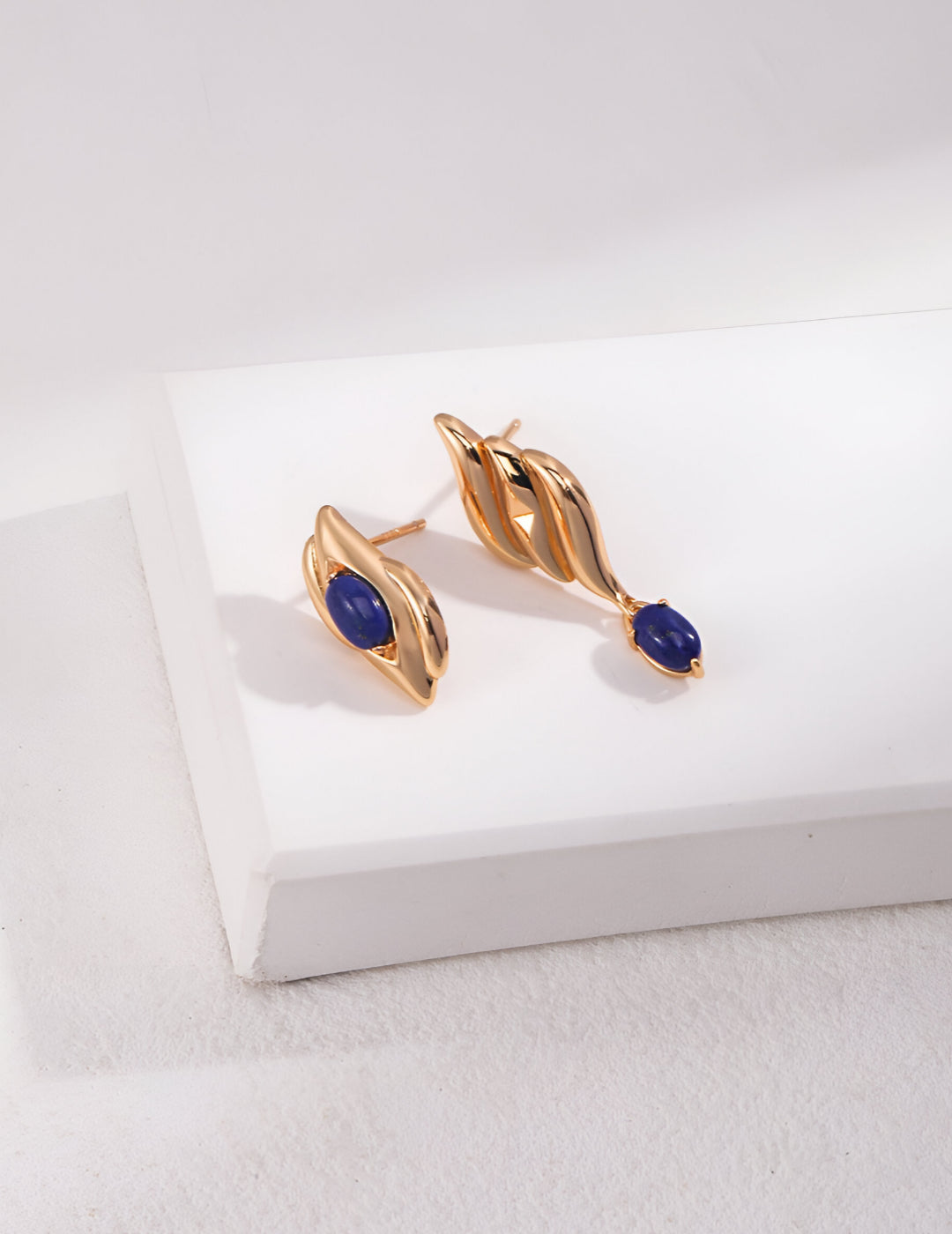 Capturing the essence of artistic beauty - Expressive Earrings - S925 Sterling Silver with 18K Gold Vermeil- Embed with natural blue gemstone - Crafted to add a touch of enchantment and allure to your everyday look