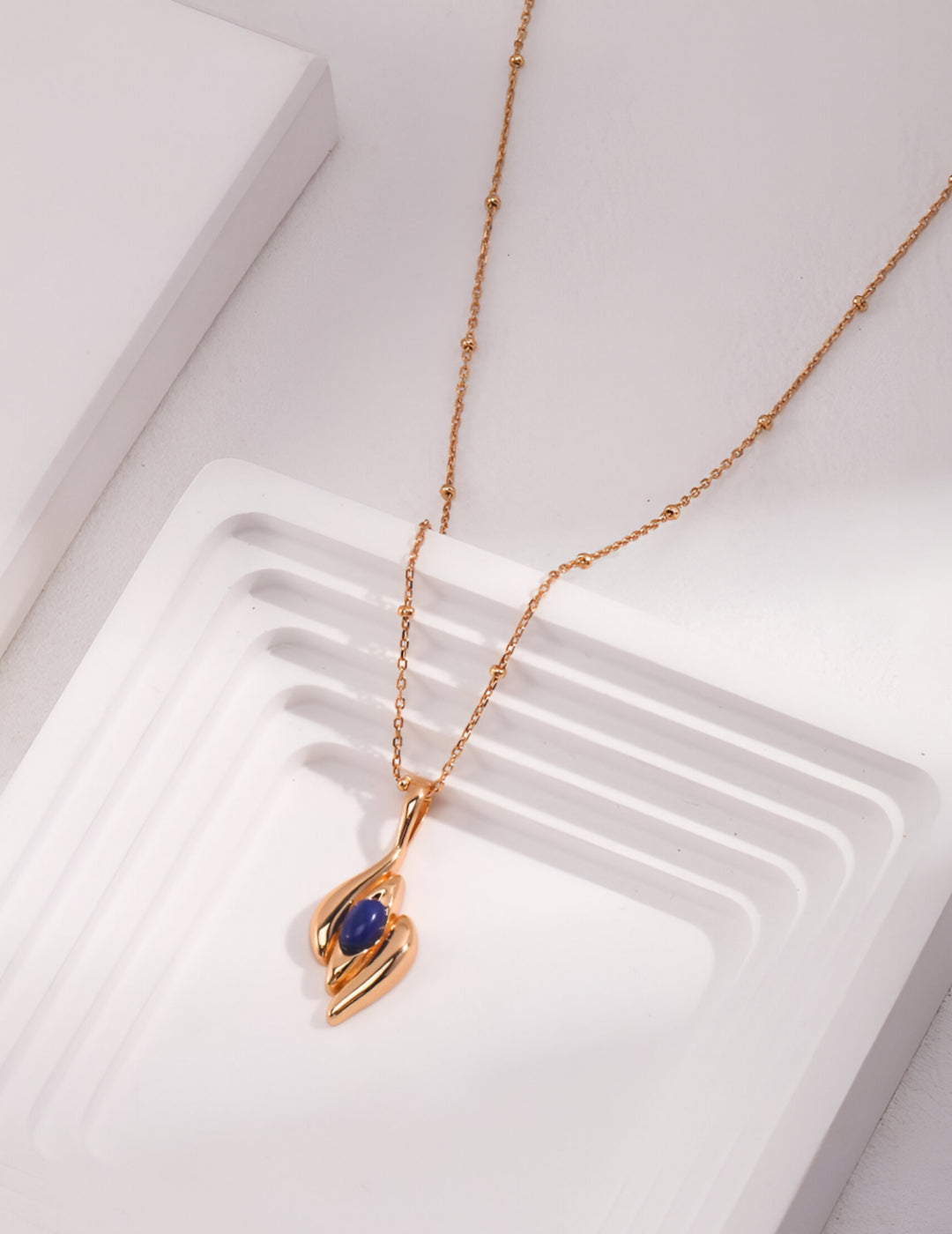 Capturing the essence of artistic beauty - Expressive Earrings - S925 Sterling Silver with 18K Gold Vermeil - Embed with natural blue gemstone - Crafted to add a touch of enchantment and allure to your everyday look