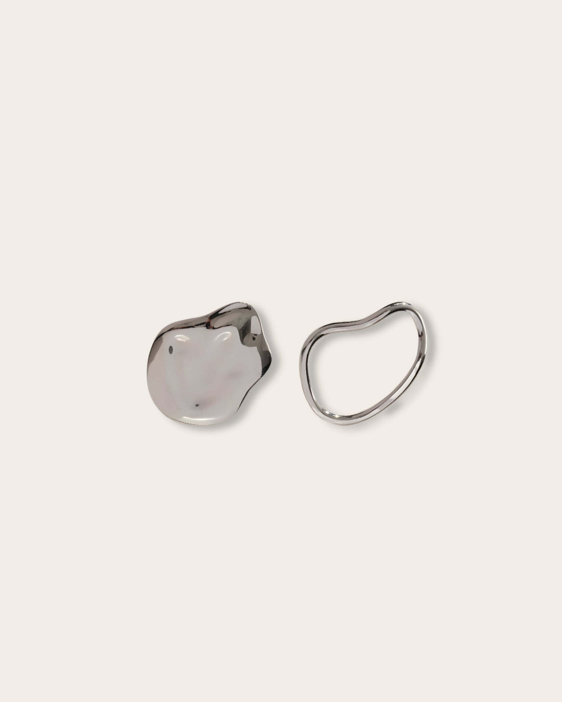 Earrings showcase a striking negative vs positive space design - Elevate your style with Balance in Asymmetry Earrings and embrace the art of unconventional elegance  - S925 Sterling Silver