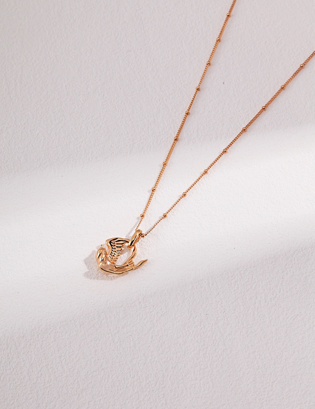 A captivating masterpiece inspired by the Mythical Bird - S925 Sterling Silver with 18K Gold Vermeil - Radiate elegance and embrace your inner strength