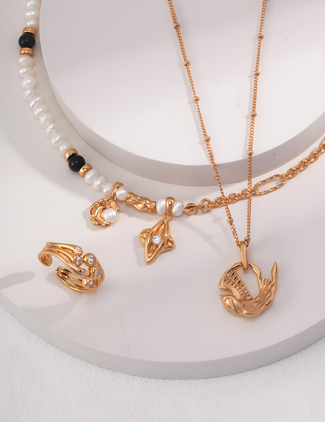 A captivating masterpiece inspired by the Mythical Bird - S925 Sterling Silver with 18K Gold Vermeil - Radiate elegance and embrace your inner strength