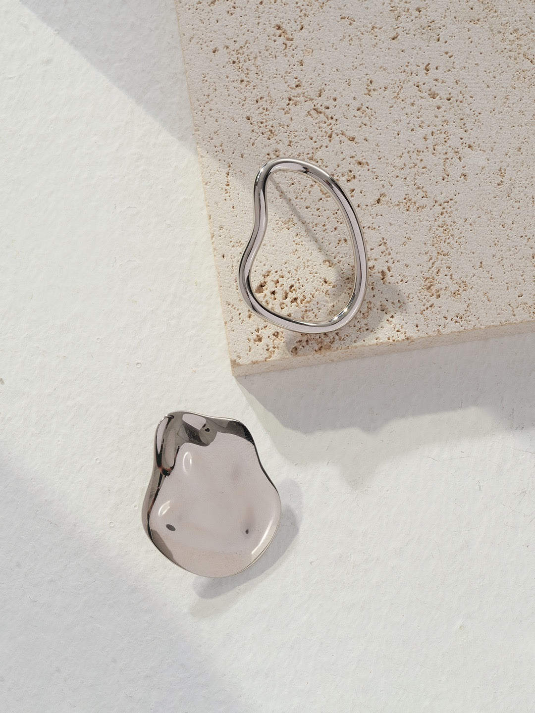 Earrings showcase a striking negative vs positive space design - Elevate your style with Balance in Asymmetry Earrings and embrace the art of unconventional elegance  - S925 Sterling Silver